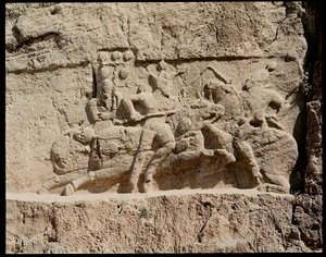 View of the Necropolis and the tombs belonging to Achaemenid kings, relief representing scenes of battle by School Persian