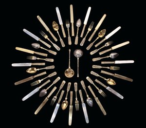 A silver-gilt and niello flatware service by School Russian