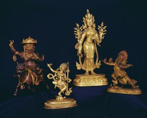 Tibetan figures: Vajravarahi dancing on a human corpse; figure of Padmapari; figure of Beg-tse; figure of Dam-can Dor-je Legs-pa riding a horse