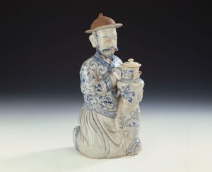 An unrecorded Annamese blue and white ewer formed as a kneeling attendant by School Vietnamese