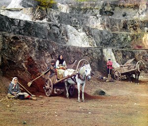 Work at the Bakalskii mine: a family, with shovels and horse-drawn carts, working at the iron mines in the Bakaly hills, Ural Mountains, Russian Empire, 1910 by Sergey Prokudin Gorsky