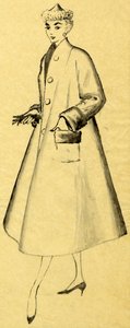 Woman in duster coat and pointed hat