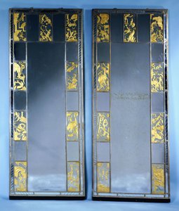 A pair of Orrefors mirrored doors, with circus scenes by Simon Gate