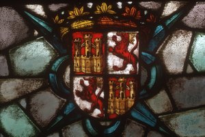 A coat of arms depicting two castles and two rampant lions