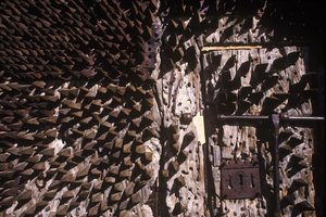 Metal spikes embedded in a castle door by Spanish School