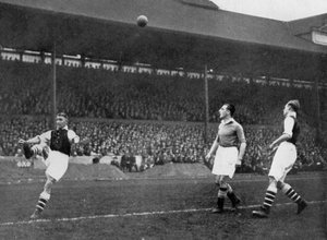 Acrobatics in an Arsenal v Chelsea match at Stamford Bridge, London, c1933-c1938