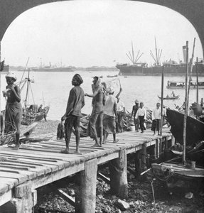 Landing Stage on the Irawaddy River, Rangoon, Burma by Stereo Travel Co