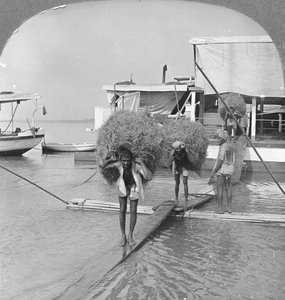 Unloading a Vessel on the Irrawaddy River, Burma, 1908
