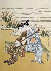 The shamisen: couple playing shamisen (or samisen: long sleeve lute with three strings) - by Harunobu, in 