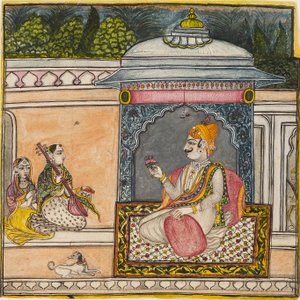 A Raja listening to music on a terrace
