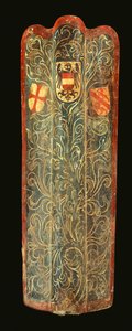 A rare Swiss pavise of wood covered with gesso painted canvas of green scrolling foliage design and the shields of arms of Habsburg, the League of St George, and the town of Winterthur