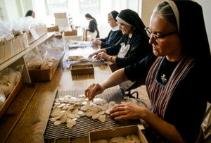 Nuns Making Communion Wafers