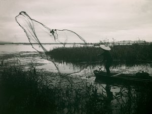 Japanese Fisherman Casting His Nets on a Lake, circa 1900 - 1915 by Teijiro Takagi