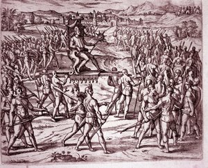 The Inca king, Atahualpa, holding a scepter in the shape of a sun, is carried on a litter to meet Francisco Pizarro (Engraving) by Theodore de Bry