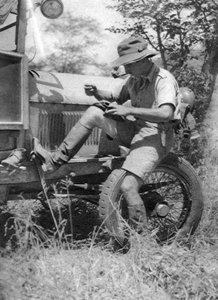 Chaplin Court Treatt, British Motoring Pioneer, Mending His Veldtschoen Shoes