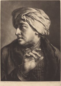 A Man with a Turban and Striped Shirt