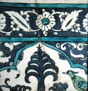 Isnik tile with floral design and border by Turkish School