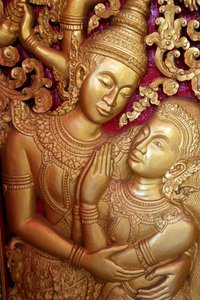 Wat Ong Teu Buddhist temple. Doorway carving depicting scene from the Ramayana, Vientiane, Laos