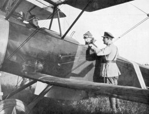 Albert I of Belgium, leaving by plane to visit the lines of the Yser