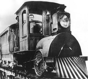 American inventor Thomas Alva Edison on board an electric railroad, 1892 by Unbekannt