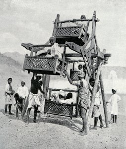 Arabian Children Enjoying a Big-Wheel by Unbekannt