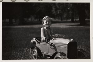 Boy driving a toy pedal car, c 1930 by Unbekannt