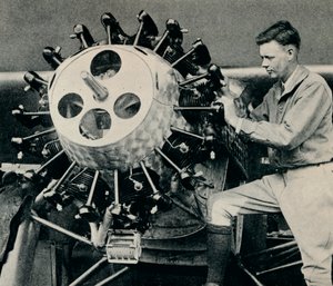 Charles Lindbergh checking the engine of his aircraft before his transatlantic flight by Unbekannt