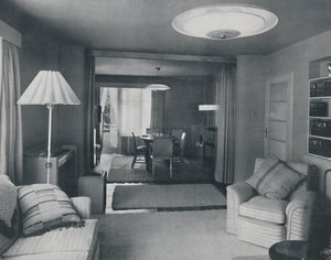 Dining and Living Room, Divided Only by Heavy Curtains in an Attractive Modern Weave