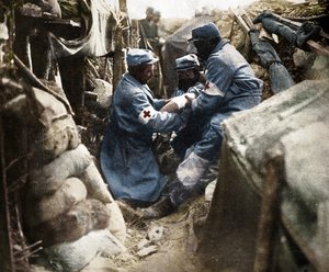 First Aid to a Wounded Man in One of the French Trenches, 1915