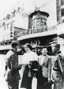 German Soldiers Chatting Up French Women Outside the Moulin Rouge, Occupied Paris by Unbekannt