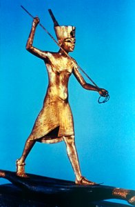 Gold figure of King Tutankhamun standing on a reed boat and spearing fish, 14th century BC by Unbekannt