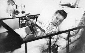 Greek Boy from Pylos Being Nursed in the Sick Bay of the British Battleship HMS Malaya by Unbekannt