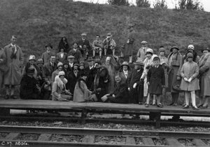 Group of tourists on a railway platform, Abisko, northern Sweden