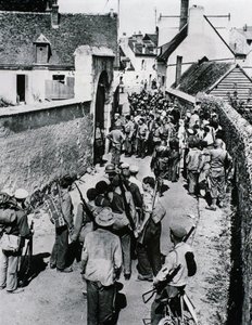 Groups of French Resistance fighters wait for the distribution of weapons in a house, July 1944 by Unbekannt
