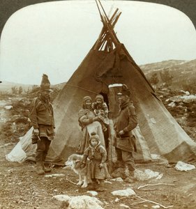Laplander family and sledge dog - outside their summer home - on a hillside in Norway, c1905 by Unbekannt