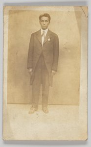 Photographic postcard of a man in a suit, 1904-1918