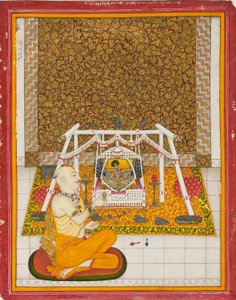 Priest at a Krishna shrine