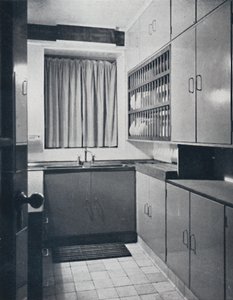 R. W. Symonds and Partner, L. & A.R.I.B.A. - Kitchen: Putty-coloured cellulosed fitments, stainless