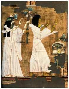 Rames and his wife in adoration before a table heaped with offerings