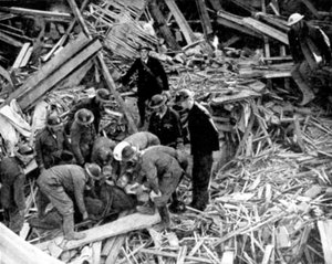 Rescue Workers Releasing a Man from a Bomb Damaged Building, World War II, 1940