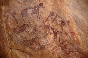 Rock Art, Prehistory: Painting of a Group of Cattle and Characters in an Ornate Shelter, Uweinat Massif, Sudan by Unbekannt