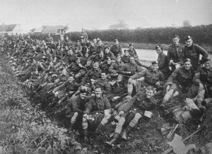 Royal Army Medical Corps recruits take a meal in the open