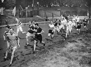 Running the half mile at the Civil Service Sports day, Stamford Bridge, London