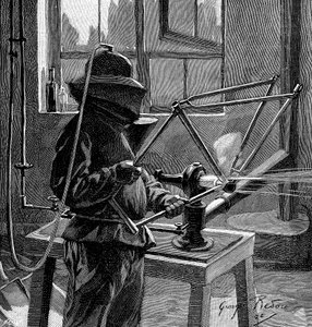 Sandblasting the Joints of a Bicycle Frame, France by Unbekannt