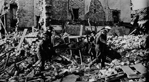 South Wales had its turn early in the New Year. A stretcher party carries a casualty to safety