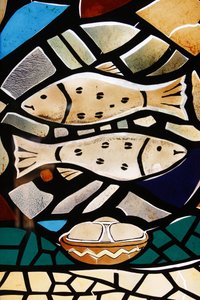 Stained glass: Christian symbols: the fish, symbolizing early Christians, Togoville, Togo