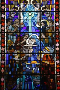 Stained glass in Notre Dame du Rosaire catholic church: Nativity scene, Saint-Ouen, France
