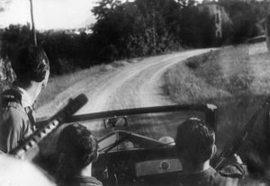 The Italian resistance movement: armed partisans on a jeep, Langhe, Piedmont, Italy by Unbekannt