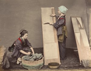 Two Japanese Women Posing with Laundry