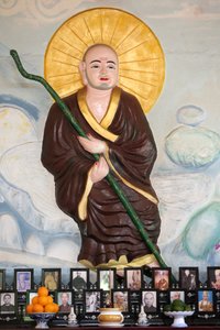 Van Hanh Zen Buddhist Monastery. Buddhist Monk Over Vietnamese Altar for Ancestors. The Veneration of the Dead. Dalat, Vietnam by Unbekannt